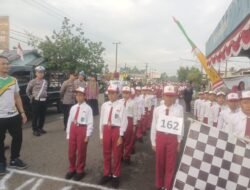 Kapolsek Barat Lakukan Pengamanan Lomba Gerak Jalan